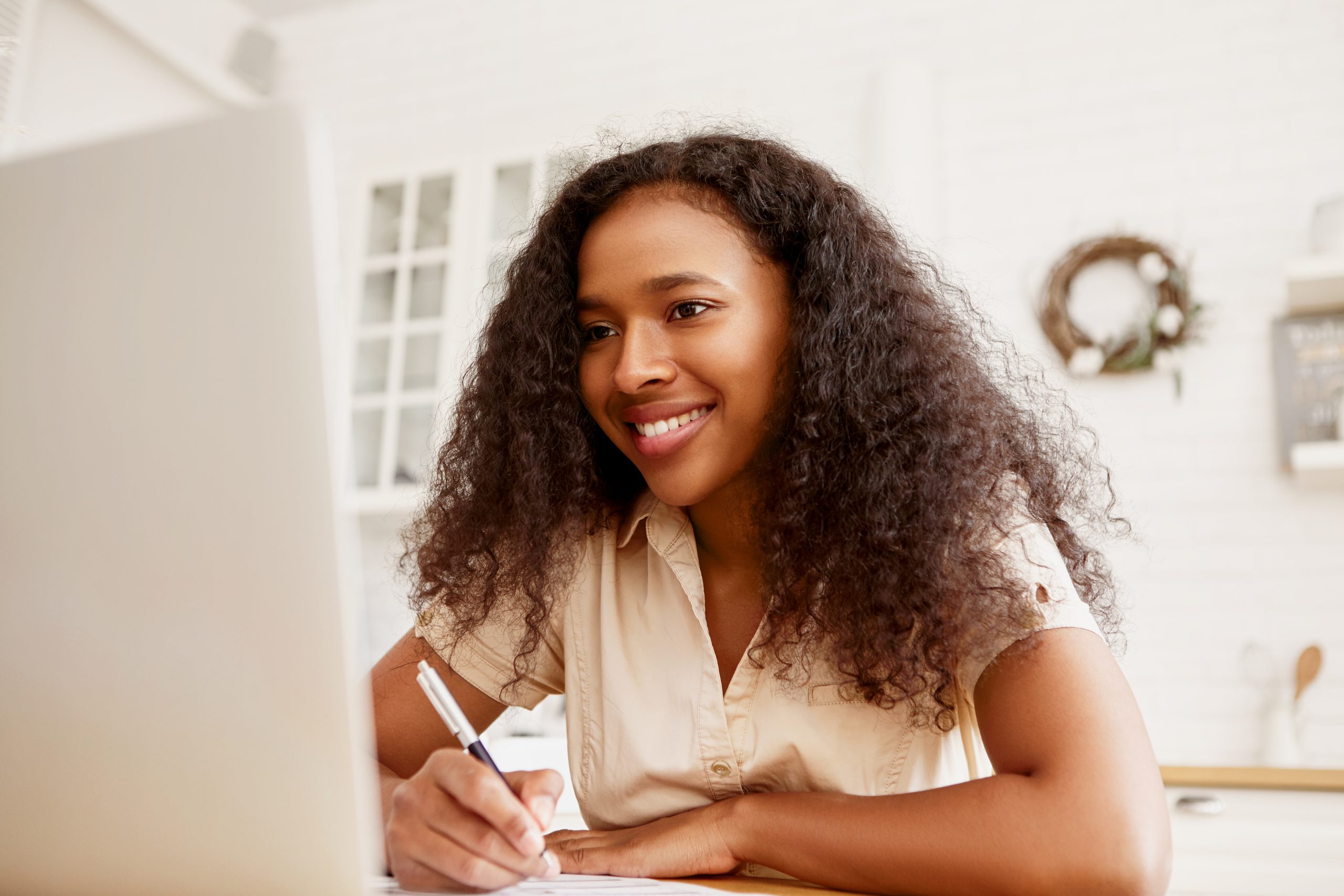 Indoor shot of confident cheerful young dark skinned female free